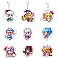 six keychais with different anime characters on them, all in various colors and sizes