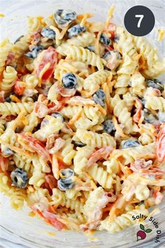 the pasta salad is ready to be eaten in the microwave and served with blueberries