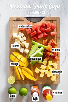 the ingredients for mexican fruit cups laid out on a cutting board with text overlay