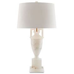 a white lamp with a marble base and a white shade on the top of it