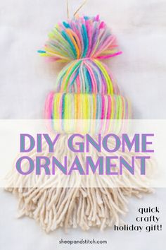 the diy gnomee ornament is made with yarn and tassels