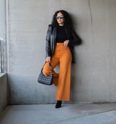 Orange Bootcut Pants Outfit, Orange Flared Pants Outfit, Orange Jeans Outfit Winter, Orange Chic Outfit, Orange Wide Pants Outfit, Orange Work Pants Outfit, Burn Orange Pants Outfit, Orange Denim Pants Outfit, Orange Shirt Black Pants Outfit