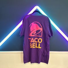 Live Mas In This New Taco Bell Tee! Brand New With Tags. No Rips, No Tears. Ptp 22in, Length 30in. 100% Cotton. Taco Bell Shirt, Hot Topic Shirts, Cell Phone Holster, Taco Bell, Walker Boots, Pajama Shirt, Fit N Flare Dress, Rain And Snow Boots, Boot Sandals