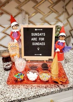 an assortment of sundaes is displayed in front of a sign