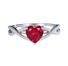 a heart shaped ruby and diamond ring