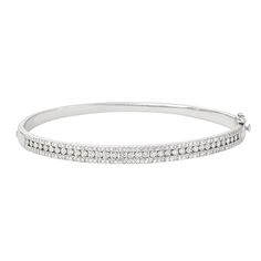 "This gorgeous sterling silver diamond bangle bracelet is the perfect way to finish any outfit. This gorgeous sterling silver diamond bangle bracelet is the perfect way to finish any outfit. Length: 7 in. Metal: sterling silver Plating: rhodium Finish: polished Packaging: boxedDIAMOND DETAILS Total weight: 1/2 ct. Shape: round Setting: prong Diamond weights are approximate. Diamond total weights may vary between .01 and .08 ct. Some diamonds have fewer than 17 facets. Gemstones may have been tre Stackable Diamond Bangle Bracelet, Classic White Gold Cuff Bracelet With Single Cut Diamonds, Silver Diamond Bangle With Pave Setting, White Diamond Pave Bangle Bracelet, White Diamond Bangle Bracelet With Pave Setting, Stackable Diamond Bracelet, Diamond White Stackable Diamond Bracelets, Stackable Diamond Bracelet In Fine Jewelry Style, Classic White Gold Cubic Zirconia Cuff Bracelet