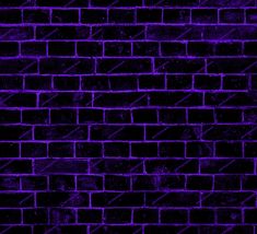 a purple brick wall that is very dark