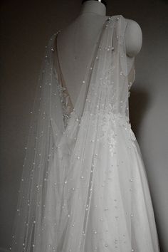 the back of a wedding dress on display