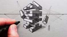 someone is drawing something with pencils on the paper and it looks like they are stacked up