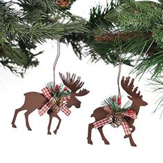 two reindeer ornaments hanging from a christmas tree