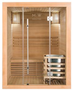 the inside of a sauna with wooden floors and lights