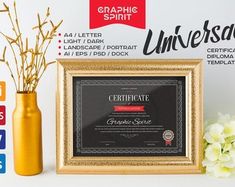 an award certificate is displayed in front of a vase with flowers and other items around it