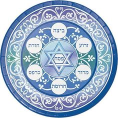 a blue and white plate with an image of the star of david on it's center