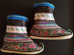 Beautiful embroidered handmade Miao boots from Yunnan Province, Southwest China. Silk and gold thread hand embroidery on black silk lower part of boot with cotton and silk upper sections. Cloth soles show some signs of wear, but boots are in great condition. Height: 22cm (8.8") Length: 25cm (9.84") Embroidery On Black, China Collection, Handmade Boots, Handmade Boot, Gold Thread, Gold Threads, Black Silk, Embroidery Art, Etsy Australia