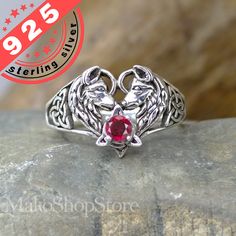 "Handmade Wolf couple heart shaped ring in sterling silver With/without birthstone This is an Handmade high quality sterling silver ring Materials: 925 sterling silver Stamped \"925\" Stone: 3mm round faceted birthstone (shown on pictures with January) Measurements: front 18mm wide Select bellow your size & stone. Comes with jewelry box Handmade in Canada by our silversmith artist. If you select no gemstone we will make a nice triquetra pattern instead Exclusively here directly from it's Designer Artist ! All our jewelry include a gift box. Matching cuff bracelet, earrings and pendant also available visit our shop for more: https://www.etsy.com/ca/shop/MakoshopStore" Wolf Couple, Couple Heart, Heart Shaped Ring, Box Handmade, Heart Shaped Rings, Locket, Cuff Bracelet, Silver 925, Birthstone