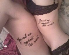 two women with matching tattoos on their legs that say, you and me are against the world