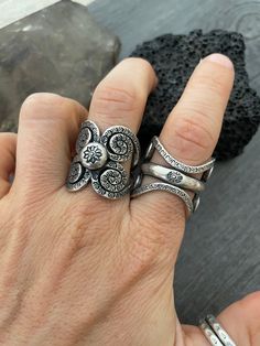 You can choose between 4 different and unique sterling silver rings. Each has a different style and design, but all are perfect for your day by day outfits and super comfy and easy to match with other accessories and any outfit. In one of the pictures you can see a number that represents each ring for you to choose from. Ring #1- Size 8.75, can be open to a bigger size but this will create a gap in the front. And the ring is 2.7cm- 1.10 inch long Ring #2- Size 8.5 , can be open to a bigger size Unique Adjustable Sterling Silver Wide Band Ring, Unique Adjustable Wide Band Sterling Silver Ring, Unique Handmade Wide Band Round Ring, Handmade Sterling Silver Wide Band Promise Ring, Unique Handmade Wide Band Ring For Anniversary, Unique Silver Open Ring, Unique Sterling Silver Wide Band Promise Ring, Unique Handmade Wide Band Anniversary Ring, Unique Stackable Wide Band Sterling Silver Rings