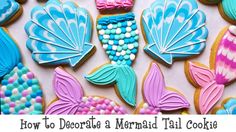 decorated cookies with mermaid tails and pearls on them, in the shape of seashells