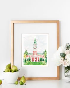 a watercolor painting of a church with flowers and pears in the foreground