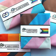 🏴 The famous Progress Pride Flag, complete with grommets and double-stitched edges to reduce fraying. ✍️ The Design: Designed in 2018 by our friend Daniel Quasar, the "Progress" Flag places 5 half sized stripes in an arrow shape representing trans and non-binary individuals, marginalized POC communities, as well as those living with AIDS on top of the traditional LGBTQ Rainbow Flag. 🔲 Love the design but want something a little smaller? Here are all of the Progress Flag items we offer: Stick-o Progress Flag, Folded Flag, Progress Pride Flag, Boat Flags, Lgbtq Rainbow, Best Flags, Gay Pride Flag, Candle Cards, Pride Stickers