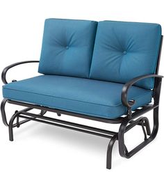 a chair with two blue cushions sitting on it's back legs and armrests