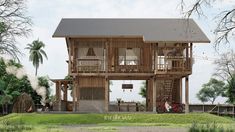 a wooden house sitting on top of a lush green field