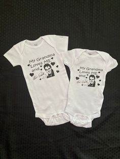 A perfect add a style to your mini-me's wardrobe with our designed sleeveless onesies bodysuit from a Elvis Fan Grandma or Nana! Perfect time to share with your grandchildren Elvis Presley's music! Perfect Baby Shower Gift! Made from super soft, comfortable, and stretchy fabric, this baby bodysuit with keep them nice and comfy. Expandable lap shoulder neckline helps to pull garment over baby's head more easily. Conveniently positioned higher in the front bottom snap closure for easy changing. Th White Fitted Short Sleeve Bodysuit With Graphic Print, Fitted Onesie With Name Print For Parenting, Fitted Graphic Print Onesie For Playwear, Customizable Fitted Bodysuit For Playtime, Fitted Family Matching Onesie With Graphic Print, Elvis Presley Music, Baby Head, Perfect Baby Shower Gift, Front Bottoms