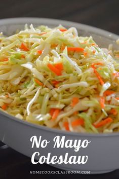 coleslaw in a bowl with carrots and celery