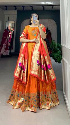 Display your beauty with orange color gown made of jacquard silk material beautify with weaving zari weaving work. It can be carry for any casual occasion. Orange Colour Dress, Dress Party Wear, Party Wear Dress, Silk Dress Long