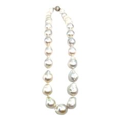 This beautiful Baroque pearl necklace features pearls that are 12 mm to 15 mm thick. A gorgeous addition to any wardrobe. White Pear-shaped Akoya Pearl Necklace, Elegant Briolette Pearl Necklace, Elegant Pearl Necklace With Briolette Shape, Classic Baroque Pearl Drop Necklaces, Luxury Pear-shaped Pearl Drop Necklace, White High Luster Round Beaded Necklaces, White High Luster Round Bead Necklaces, White High Luster Round Beads Necklace, Classic Baroque Pearl Necklace With High Luster