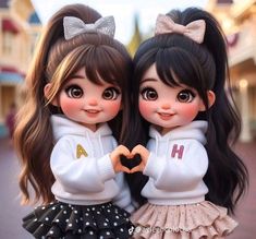 two dolls that are standing next to each other with hearts in their hands on the street