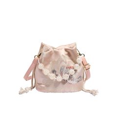 The Blossom-Petal Beaded Shoulder Bag brings a touch of traditional elegance to your modern wardrobe. Inspired by Han Chinese clothing accessories, this exquisite bag features intricate floral embroidery and a delicate bead handle, adding a sophisticated charm to any outfit. Its compact size is perfect for carrying your essentials, while the drawstring closure ensures your belongings stay secure. Ideal for both casual and formal occasions, this bag is a versatile accessory that seamlessly blends traditional aesthetics with contemporary fashion. Beaded Shoulder Bag, Reindeer Headband, New Chinese Style, Chinese Clothing, Modern Wardrobe, New Chinese, Dress Jewelry, Shoulder Messenger Bag, Contemporary Fashion