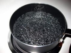 boiling water in a pan on the stove