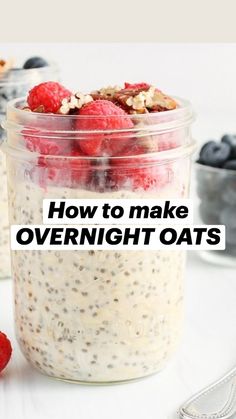 three jars filled with oatmeal and raspberries on top of a table