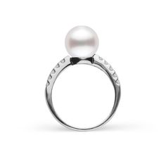 This 9.0-10. mm AAA quality White South Sea pearl ring showcases the pure organic beauty of elegant south sea pearl. The flawless pearl appears to float above the gold, yet is securely attached by a strong post. The classic-style ring features a solid 14-karat gold band that is set with 0.25 carats of diamonds. The ring setting is made in-house and is composed of solid 14 karat gold. We use an extra-fine diamond grade (VS1-G), which is normally reserved for solitaire settings. It's rare to see t Timeless Akoya Pearl Drop Ring, Timeless Akoya Pearl Round Rings, Timeless White Akoya Pearl Ring, White Akoya Pearl Timeless Ring, Timeless Akoya Pearl Ring For Formal Occasions, Formal Akoya Pearl Drop Rings, Formal Pearl White Pearl Ring, Timeless Akoya Pearl Ring For Anniversary, Timeless Pearl White Pearl Ring For Anniversary