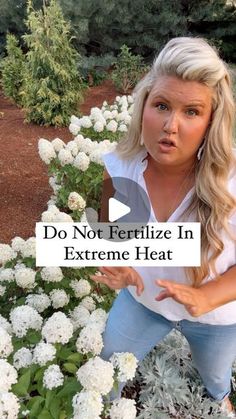 a woman standing in front of flowers with the words do not fertiize in extreme heat