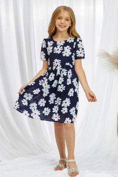 This cute dress is perfect for formal or casual occasions. •This girls midi dress is full of floral prints that is bright, cheery, cute and beautiful. •Made of silky smooth satiny fabric, fully lined for an elegant look and feel. •This dress has convenient pockets to carry important items. •Hidden zip up back. Very nicely made casual/formal dress! Size Chart (INCH) Sizes Bust Shoulder Sleeve_Length Length Relax Relax Relax Relax S 26.0 10.6 6.3 24.4 M 27.6 11.0 6.9 27.2 L 29.5 11.9 7.5 29.9 XL 3 Flowy Navy Dress For Spring, Navy Flowy Dress For Spring, Short Puff Sleeve Dress, Transparent Clothing, Casual Formal Dresses, Clothing Packaging, Print Chiffon Dress, Short Puff Sleeve, Blue Crewneck