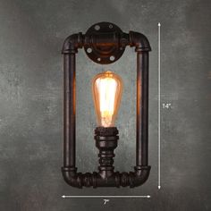 an old fashioned light fixture is shown with the measurements for it's bulb and pipe