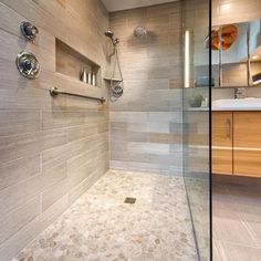 a walk in shower sitting next to a sink