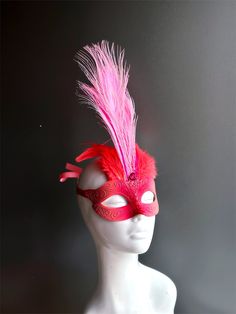 This masquerade mask boasts a whimsical flamingo design, evoking the spirit of the tropics and adding a touch of playfulness to your ensemble. Delicate feathers sprout from the mask, creating an aura of exotic elegance and grace.� Whether you're attending a tropical-themed masquerade ball, or simply looking to make a dramatic entrance, this mask ensures you'll be the center of attention.


Age Group/Gender - Adult/Women

Size/Type - One size fits all adults

Mask Color - Pink

Mask Material - Pol Flamingo Mask, Pink Masquerade, Flamingo Feather, Masquerade Mask Women, Dramatic Entrance, Metal Mask, Feather Mask, Flamingo Design, Pink Mask