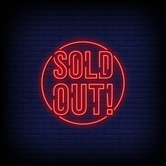 a red neon sign that says sold out on a brick wall with the word sold out