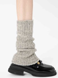 Embrace the chill of autumn and winter with these delightful leg warmers, available in classic shades of white, black, and gray. Crafted from a soft, cozy knit, these leg warmers are designed to keep you warm and stylish all season long. Cozy Beige Socks For Winter, Cozy Beige Winter Socks, Soft Beige Winter Socks, Warm Beige Socks For Winter, Warm Beige Winter Socks, Cozy Beige Leg Warmers For Fall, Soft Beige Socks For Fall, Cozy Beige Knee-high Socks For Winter, Soft Gray Winter Socks