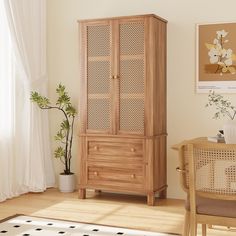 a wooden cabinet sitting on top of a hard wood floor next to a table and chair