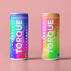 two cans of toroue are on a pink and blue background, one has a rainbow tint