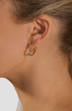 Transform your ear stack with these heart-shaped hoops that are brightly polished to make a sweet statement. 0.75" hoop diameter; 0.1" width Hinge with snap-post closure 14k-gold plate or silvertone plate Imported Gold Hypoallergenic Heart Hoop Earrings, Gold Heart-shaped Tarnish-resistant Hoop Earrings, Gold Heart-shaped Tarnish Resistant Hoop Earrings, Gold Heart-shaped Hoop Earrings, 14k Gold Heart-shaped Hoop Earrings, Heart Hoop Earrings, Ear Stack, Earrings In Gold, Keep Jewelry