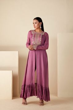 Embrace regal elegance with our Mauve Majesty Zardosi Kurta Set. Adorned with exquisite hand-embroidered zardosi, this set pairs a detailed kurta with sleek slim-fit pants for a modern twist. The luxurious georgette crepe and Tussar silk blend, in a delicate mauve, ensure a graceful drape with a comfortable fit. Elegant Front Open Wedding Sets, Elegant Palazzo Set With Zari Work And Traditional Drape, Designer Palazzo Set With Intricate Embroidery For Eid, Elegant Floor-length Chanderi Palazzo Set, Elegant Palazzo Set With Zari Work For Reception, Traditional Semi-stitched Embellished Palazzo Set, Elegant Front Open Anarkali Set In Georgette, Elegant Front Open Georgette Anarkali Set, Embellished Straight Kurta Set For Reception