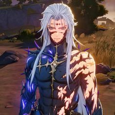 an anime character with long white hair and blue eyes standing in front of some rocks