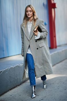 See the looks that caught our attention, and stay tuned for more of NYFW's top street style moments. Silver Boots Outfit, Street Outfits, Top Street Style, Silver Boots, New York Street Style, New York Fashion Week Street Style, Outfit Trends, Autumn Street Style, Current Fashion Trends