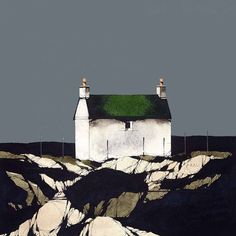 a white house sitting on top of a rocky hill next to a green roofed roof