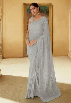 Grey georgette saree with blouse 6205  Desc:  Color : Grey Fabric : Georgette Work : Thread   Mirror Wash Care : Dry clean Sleeve Style : Sleeveless Long Sleeves : Done only in Custom Stitch Sleeves Lining : Done only in Custom Stitch Bust Size : 32 to 42 Inches Occasion : Festival   Christmas   Diwali   Eid   Ceremonial   Durga Pooja   Dussehra. With Express Free Shipping and Custom Stitching, Buy Indian Wedding Party Wear Saree Grey georgette saree with blouse 6205 online in USA, UK and Canada Party Wear Sarees Online, Latest Indian Saree, Party Wear Saree, Elegant Attire, Wedding Saree Indian, Designer Sarees Online, Stylish Sarees, Wear Saree, Georgette Saree